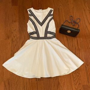 BEBE Beautiful  Embroidered Cutout Flouncy Dress